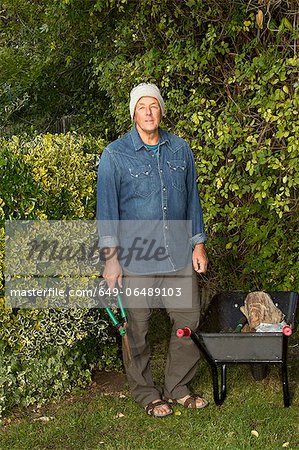 Older man working in garden