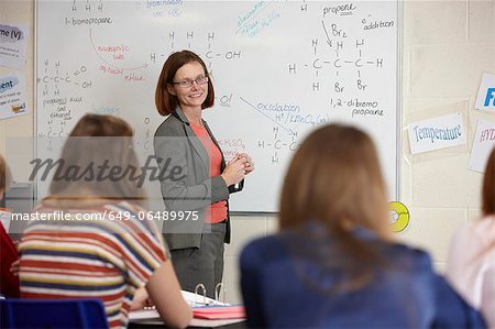 Teacher at whiteboard in science class