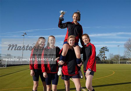 Sports team cheering together