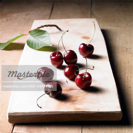 Cherries on a wooden board Cherries on a wooden board