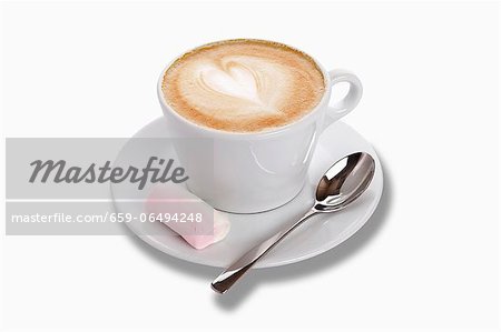 A cappuccino with a marshmallow A cappuccino with a marshmallow