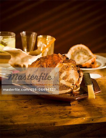 Turducken on a Platter on Wooden Table