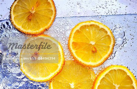 Slices of orange in soda water