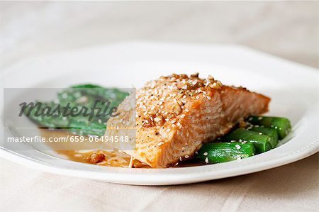 A salmon fillet on green asparagus A salmon fillet on green asparagus