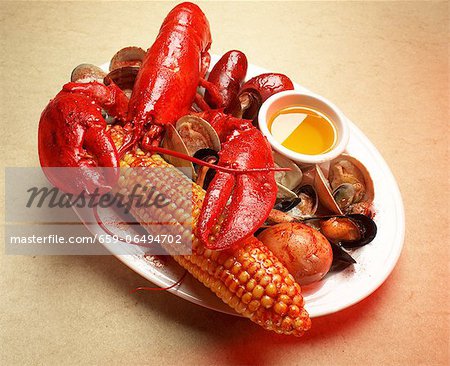 Seafood Platter with Lobster, Corn on the Cob, Clams and Mussels Seafood Platter with Lobster, Corn on the Cob, Clams and Mussels