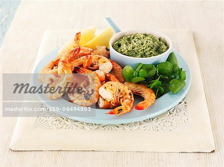 Grilled king prawns with a herb dip