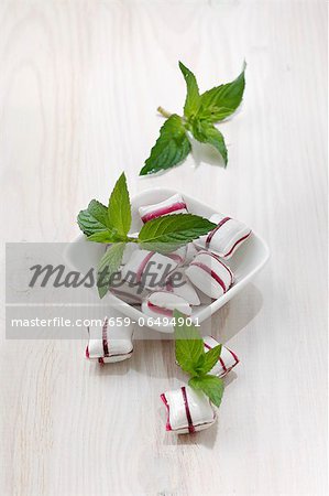 Peppermint bonbons and fresh mint Peppermint bonbons and fresh mint