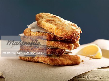 A stack of escalopes with lemon