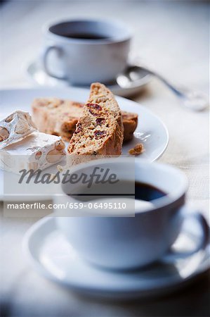 Cups of Espresso with Biscotti and Almond Nougat