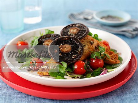 Toast topped with mushrooms and tomatoes