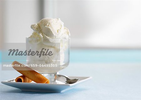 Vanilla ice cream with wafer rolls Vanilla ice cream with wafer rolls