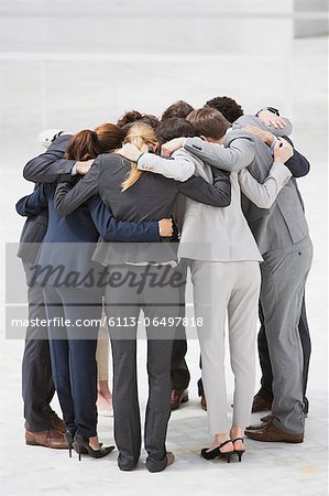 Business people in huddle
