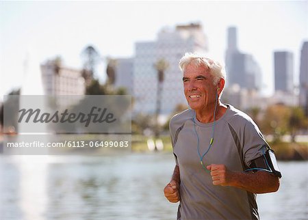 Older man jogging outdoors