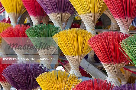 Bundles of incense sticks for sale, made by traditional craftsmen from Thuy Zuan Hat village along the road to the Tu Duc Royal Tomb, Hue, Vietnam, Indochina, Southeast Asia, Asia