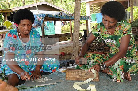 Making Tapa, a traditional cloth for decoration, Fiji, South Pacific, Pacific