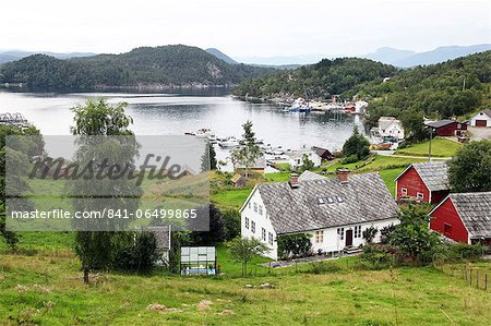 Harbour and farmhouses on Island of Borgundoya, Hardangerfjord, Norway, Scandinavia, Europe Harbour and farmhouses on Island of Borgundoya, Hardangerfjord, Norway, Scandinavia, Europe