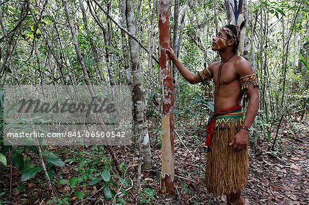 Pataxo Indian man walking at the Reserva Indigena da Jaqueira near Porto Seguro, Bahia, Brazil, South America