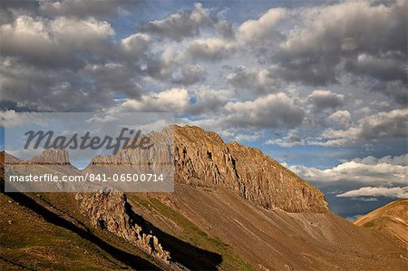 Jagged ridge with puffy clouds, Rio Grande National Forest, Colorado, United States of America, North America