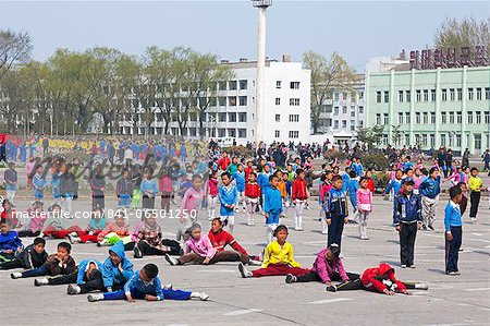 Children practising mass games outside the Grand Theatre, Hamhung, Democratic People's Republic of Korea (DPRK), North Korea, Asia
