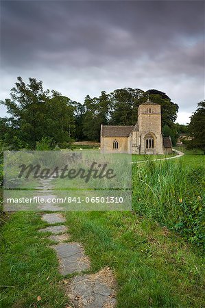 Footpath beside the River Leach leading to Eastleach Martin Church in the Cotswolds, Gloucestershire, England, United Kingdom, Europe