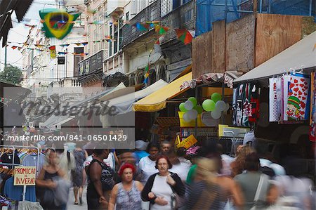 People walking along pedestrianised street of Saara district, Centro, Rio de Janeiro, Brazil, South America