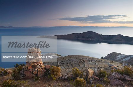 Stack of prayer stones on Isla del Sol (Island of the Sun), Lake Titicaca, Bolivia, South America