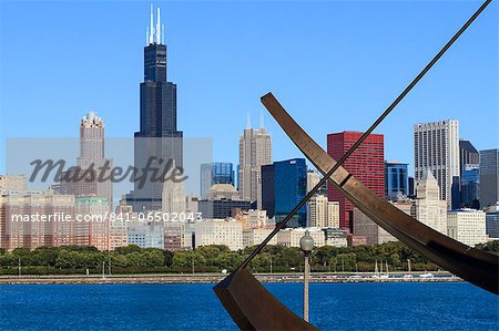 Chicago cityscape from Lake Michigan, the Adler Planetarium Sundial in the foreground with the Willis Tower, formerly the Sears Tower, beyond, Chicago, Illinois, United States of America, North America