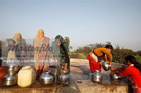 Women at a village well, Mathura, Uttar Pradesh, India, Asia
