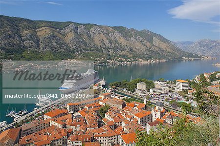 View over Old Town and cruise ship in Port, Kotor, UNESCO World Heritage Site, Montenegro, Europe View over Old Town and cruise ship in Port, Kotor, UNESCO World Heritage Site, Montenegro, Europe