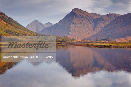 The waters of Loch Etive reflecting the surrounding mountains, Argyll and Bute, Scotland, United Kingdom, Europe
