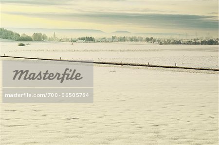 Road Through Snow Covered Fields in Winter, near Villingen-Schwenningen, Schwarzwald-Baar, Baden-Wuerttemberg, Germany