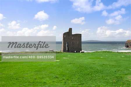 Beautiful view over the Ballybunion beach castle and cliffs in Ireland