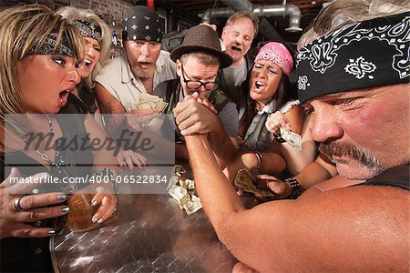 Motorcycle gang members arm wrestling with a nerd