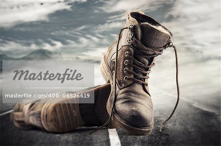 Hiking boots thrown on the street