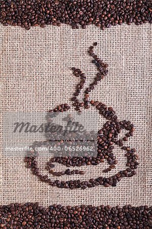 Coffee beans design on burlap surface