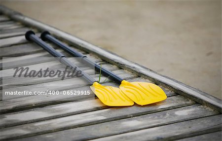 pair oars on the wooden pier