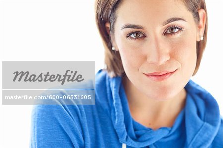 Head and Shoulders Portrait of Woman wearing Hoodie in Studio