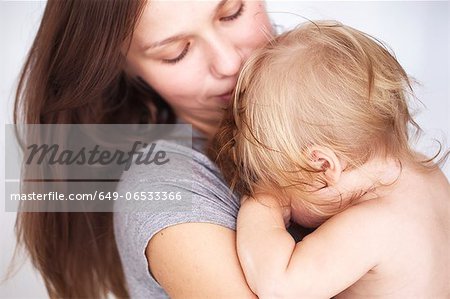 Close up of mother holding daughter