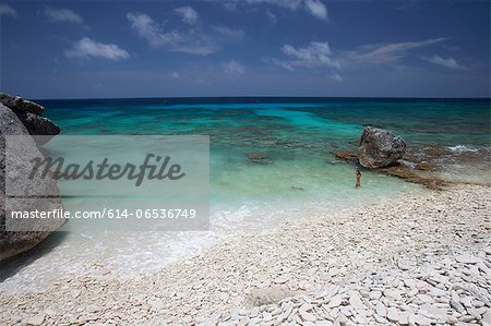 Waves washing up on tropical beach