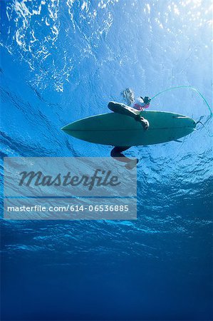 Low angle view of surfer in water