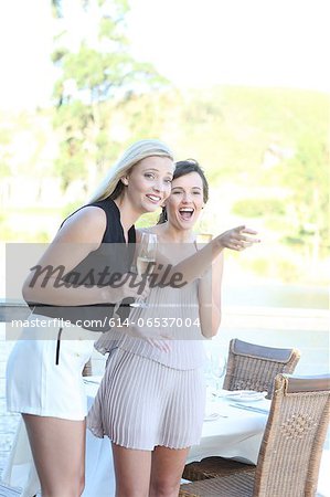 Women admiring scenery outdoors Women admiring scenery outdoors