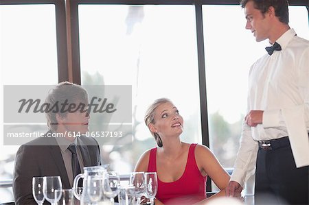 Couple having dinner at restaurant Couple having dinner at restaurant