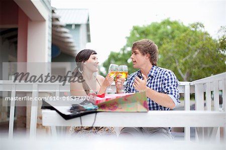 Couple toasting each other with wine Couple toasting each other with wine