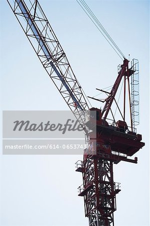 Silhouette of crane against sky