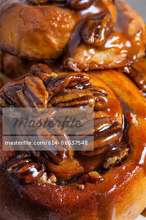 Close up of pecans on sticky buns