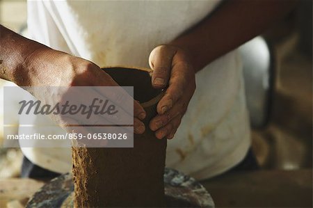 Craftsman working clay