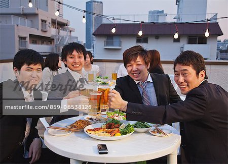 Businessmen drinking together