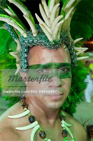 South America, Brazil, Maranhao, Sao Luis, a costumed dancer in a headdress at the Bumba Meu Boi festival in the Praca Aragao