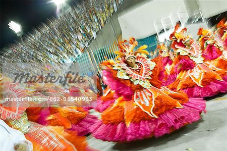 South America, Rio de Janeiro, Rio de Janeiro city, baiana dancers at carnival in the Sambadrome Marques de Sapucai