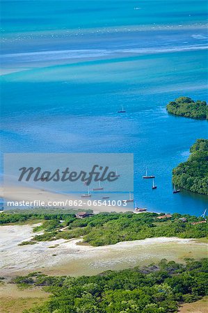South America, Brazil, Ceara, Aerial shot of fishing boats in a mangrovelined estuary near Fortaleza